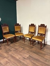 Four Edwardian Carved Walnut Dining Chairs