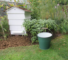 Vintage green enamel bucket