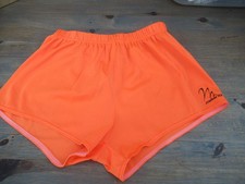 Men's orange lycra gymnastics shorts by Milano, size 36", little used