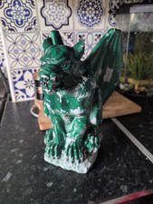 green-painted resin gargoyle