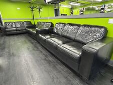 ikea black leather sofa. 2x three seaters price for all of them