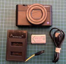 Sony Cyber-shot RX100 Mark V     (24-70mm Lens)