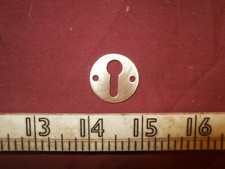 Vintage brass keyhole cover