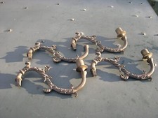 LOT OF 4 MATCHING CAST BRASS ARMS FOR EARLY  TABLE CANDELABRA UNCLEANED