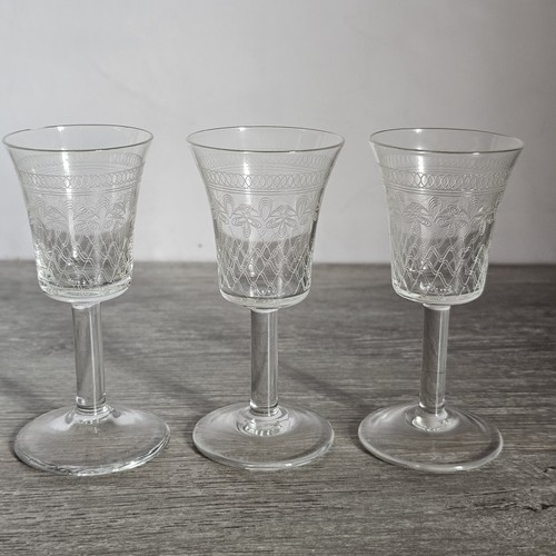 Three sherry glasses etched - three,