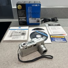 Minolta Dimage F100 4.0MP Compact Digital Camera Silver With Box, Cables ETC