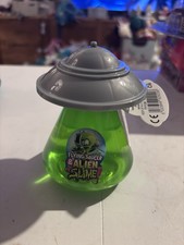 Green Light Up Flying Saucer &