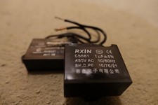 2 X CBB61 motor fan start capacitors 2 wire 3uf + 5% 450V 1 new and one used