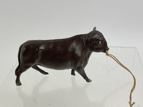 Timpo toys man leading - leading, bull