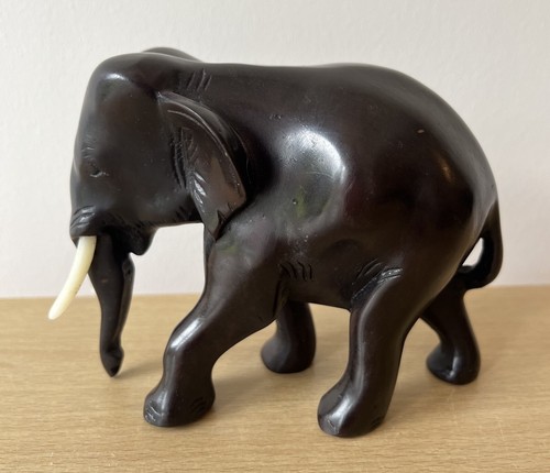 Dark brown elephant with - dark,