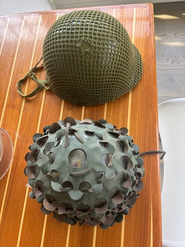 Vietnam era soldier helmets - 2,