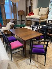 A large mid-20th century extending dining table designed by Richard Hornby