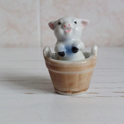 Pig tube pottery figurine - in,