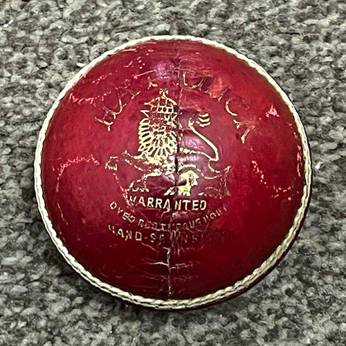 Vintage cricket ball red