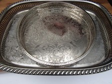 Two antique silver plated trays, one Falstaff round, & PSL rectangular shape.
