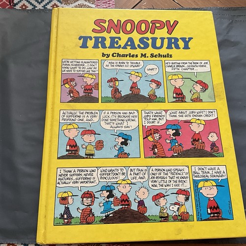 Snoopy treasury charles m - by,