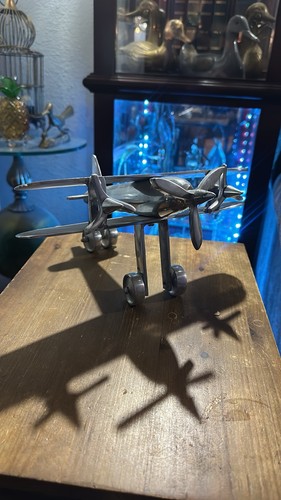 Vintage style metal biplane - style,