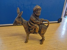 Nasreddin Hodja Riding His