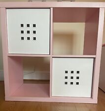 IKEA Shelving Unit. Pink Wooden shelf with 2 white plastic storage boxes.