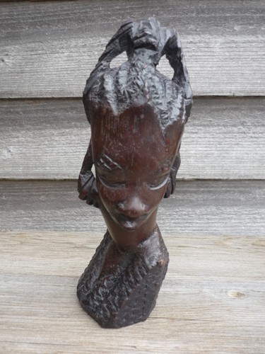 African heavy dark wood hand - heavy,
