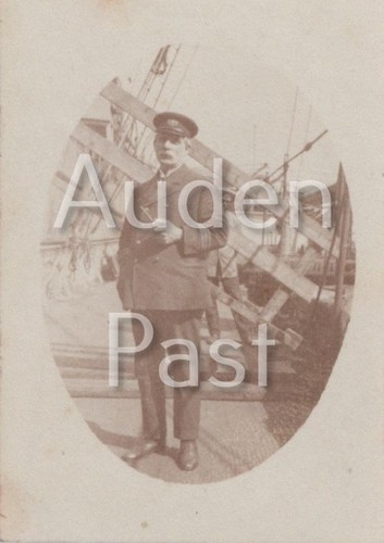 Ship officer uniform - in, beside