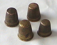 4 ITEMS ANTIQUE BRASS THIMBLES –
