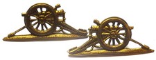 Pair WW1 artillery brass collar badges