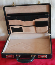 Good slim black leather executive briefcase, with double combination lock   