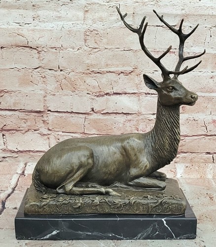 Bronze sitting stag deer - sitting,