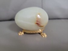 Ornamental Ivory Effect Glass Paperweight Egg Shaped On Claw Type Stand