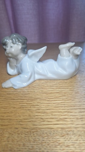 Rare angel laying - angel, down