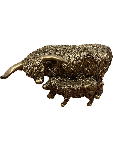 Bronze highland cow - and, calf