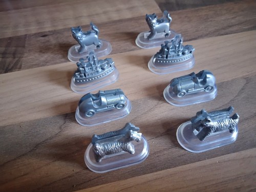 Monopoly set playing pieces - 16,
