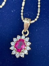 Ruby and  diamond  18ct gold  necklace and chain 2.7 grams 18 inch fine chain