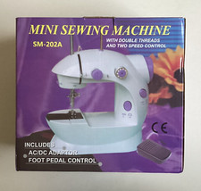 Mini Sewing Machine With