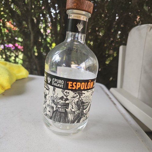 Empty tequila bottle - tequila,