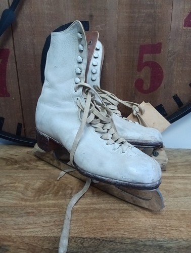 Pair vintage ice skates - of,