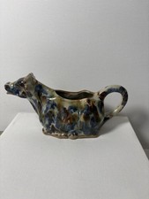 Glazed ceramic cow creamer