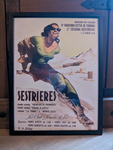 Framed poster advertising the