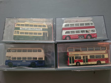 boxed corgi buses