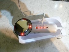 3 IN 1 SLIMMING + BEAUIYFYING  MACHINE WITH MASSAGER MISSING PADS BUT NEW NO BOX