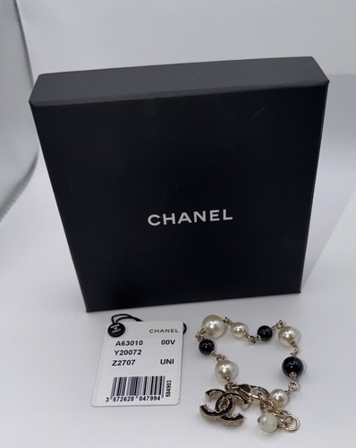 Chanel gold tone pearl - chanel,