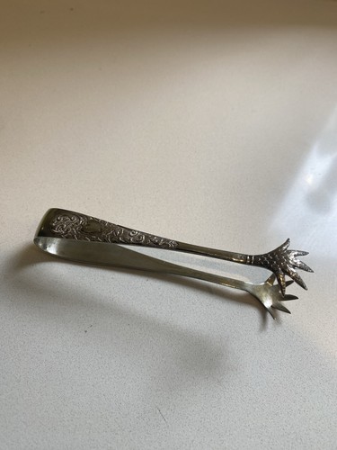 Claw handled silver sugar - claw,
