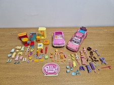 Big polly pocket bundle. Lots of clothes and accessories.