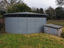 Galvanised water Tank - 68,000 Litres  Hight 7.6ft x 21ft Diameter. + fixtures 