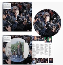 Robbie Williams - Life Thru A