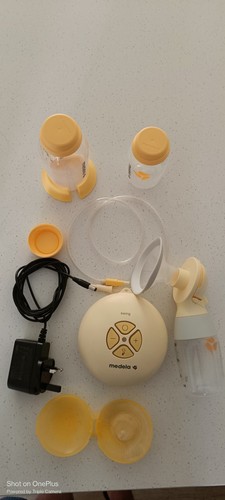 Medela breast pump and - breast,