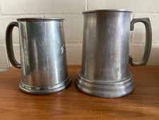 TWO PEWTER TANKARDS, ONE