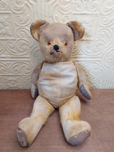 Antique straw filled teddy - filled,