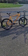 Carrera Code Disc Men's 16-Speed Alloy Mountain Bike Orange, 22'' XL Frame